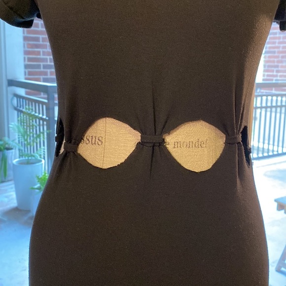 Small black shortsleeve dress with cut outs and knots at stomach waist level​ - Picture 2 of 8